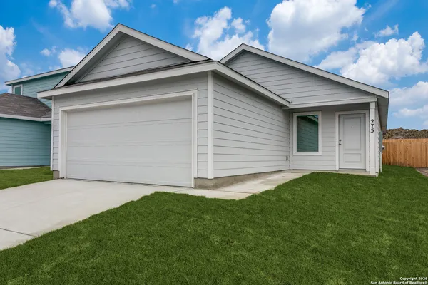 a front view of house with yard