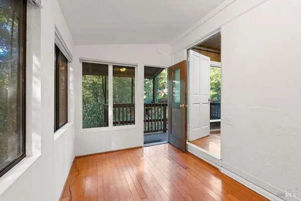 a bathroom with a sink mirror bathtub and toilet