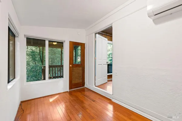 a view of stairs with wooden floor