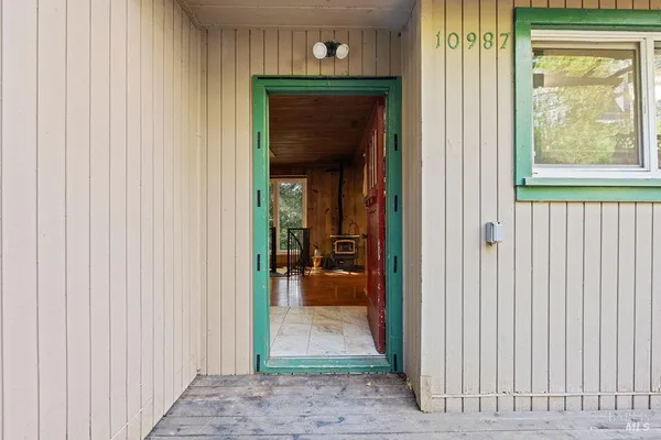 a view of a entryway door front of a house