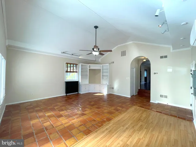 a view of a windows and chandelier in a room