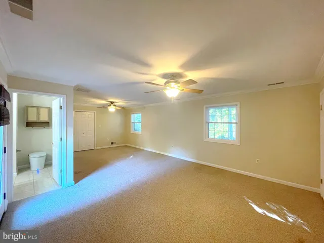 a bathroom with a double vanity sink mirror and shower