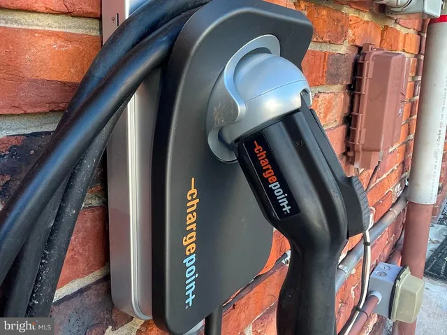 a view of a wooden deck with furniture