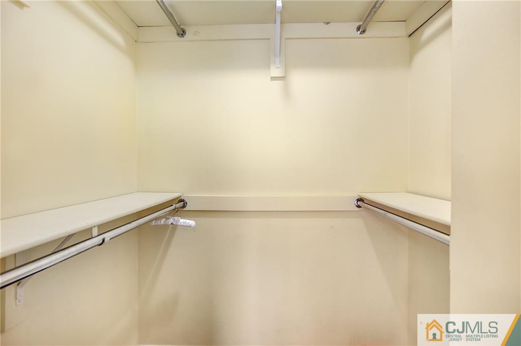 54 Holly Court Edison, NJ 08820 - Photo 15 of 25 a view of a room with racks on the wall