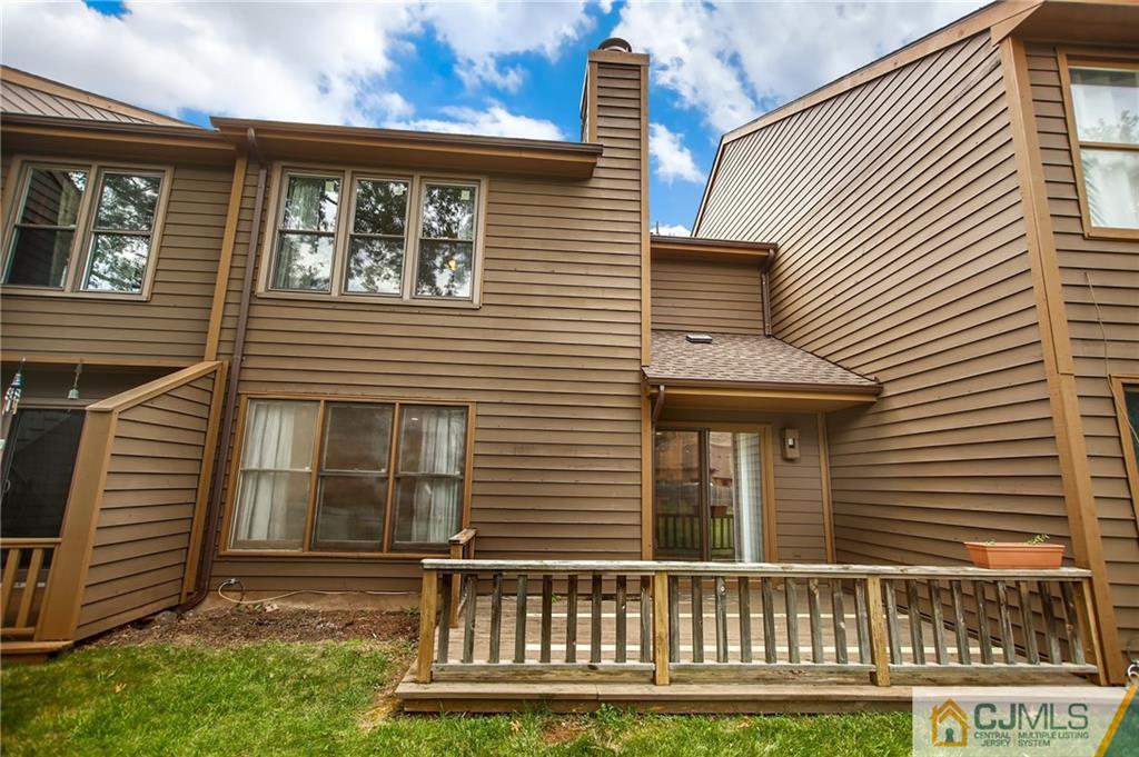 54 Holly Court Edison, NJ 08820 - Photo 19 of 25 a front view of a house with a porch