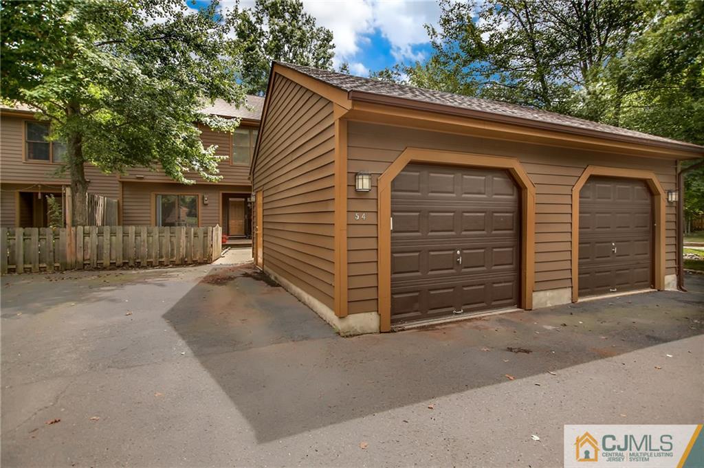 54 Holly Court Edison, NJ 08820 - Photo 20 of 25 a view of a house with a garage