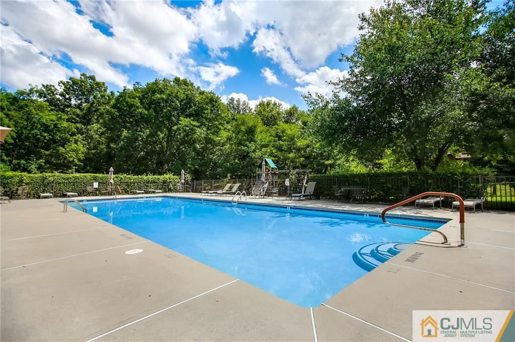 54 Holly Court Edison, NJ 08820 - Photo 25 of 25 a view of a swimming pool with lounge chair