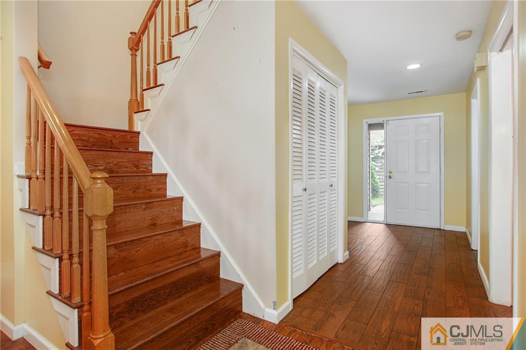 54 Holly Court Edison, NJ 08820 - Photo 10 of 25 a view of entryway with wooden floor