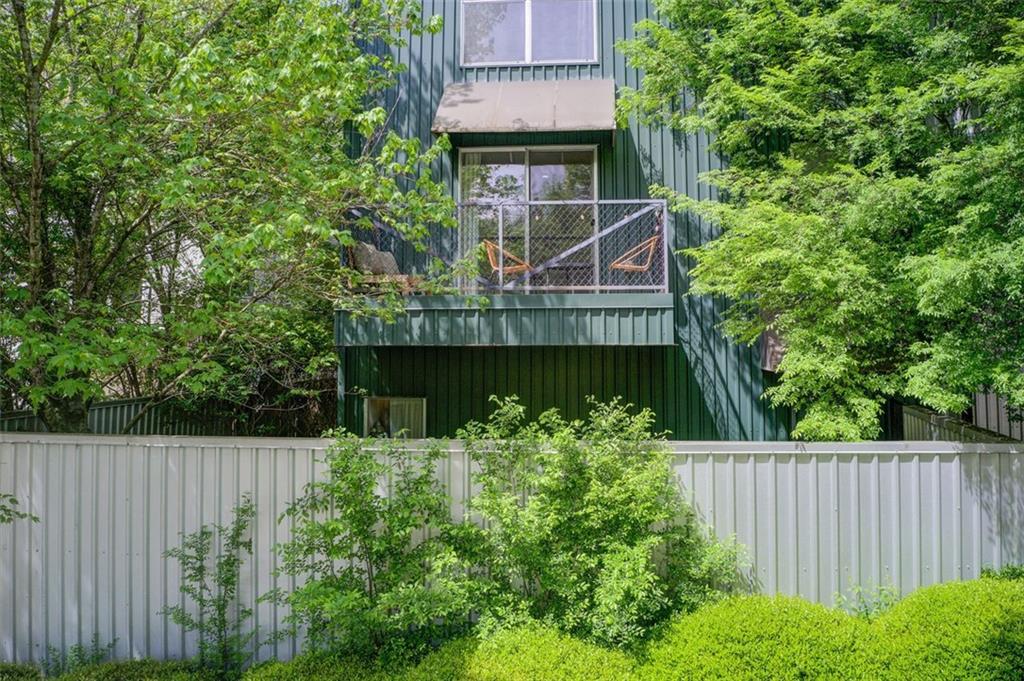 241 Maynard Terrace Southeast, Unit 7 Atlanta, GA 30316 - Photo 2 of 44 a front view of a house with garden