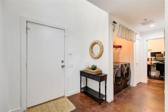 a view of living room washer and dryer