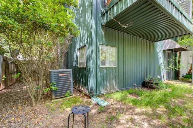 a backyard of a house with seating space