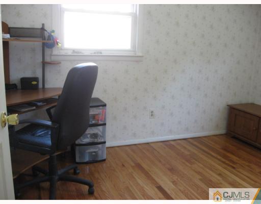 13 Sine Road Edison, NJ 08817 - Photo 5 of 10 a view of workspace with wooden floor windows