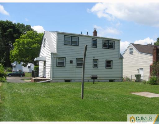 13 Sine Road Edison, NJ 08817 - Photo 7 of 10 a view of a house with a yard