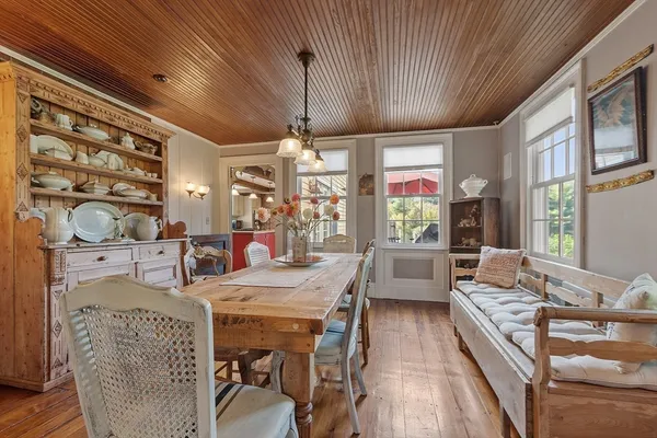 a large room with lots of wooden furniture