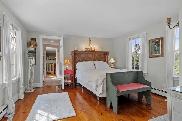 a bed room with a bed and a table