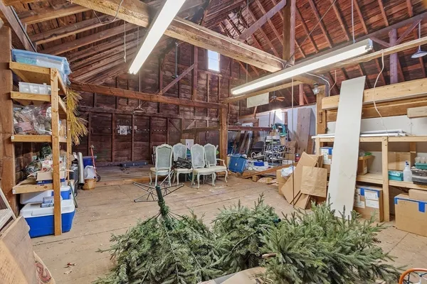 a view of a garage with chairs