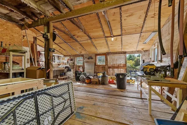 a view of a living room with furniture