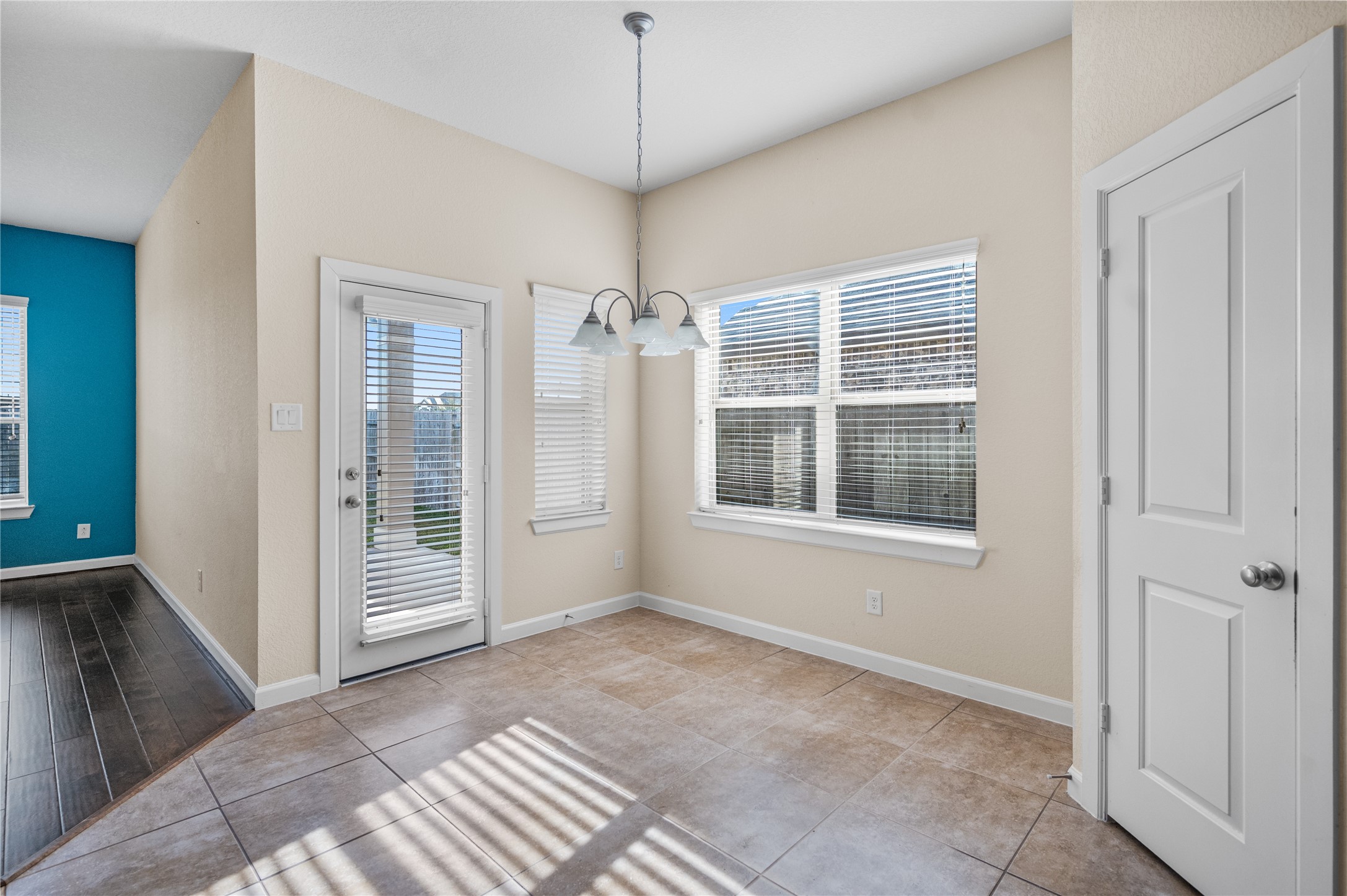 9430 Jayci Hills Lane Cypress, TX 77433 - Photo 15 of 28 a view of an empty room with a window
