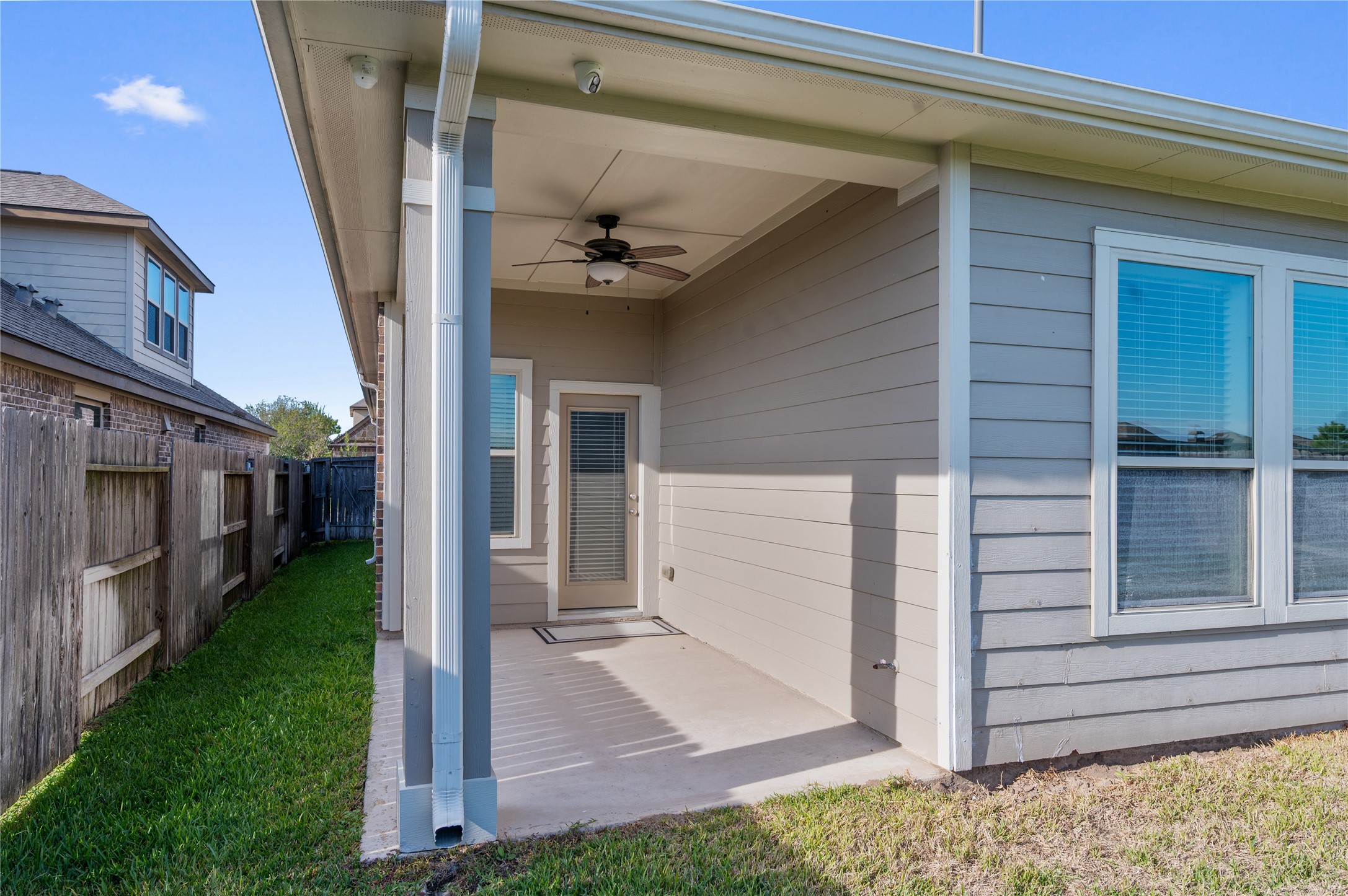 9430 Jayci Hills Lane Cypress, TX 77433 - Photo 26 of 28 a view of a porch of the house