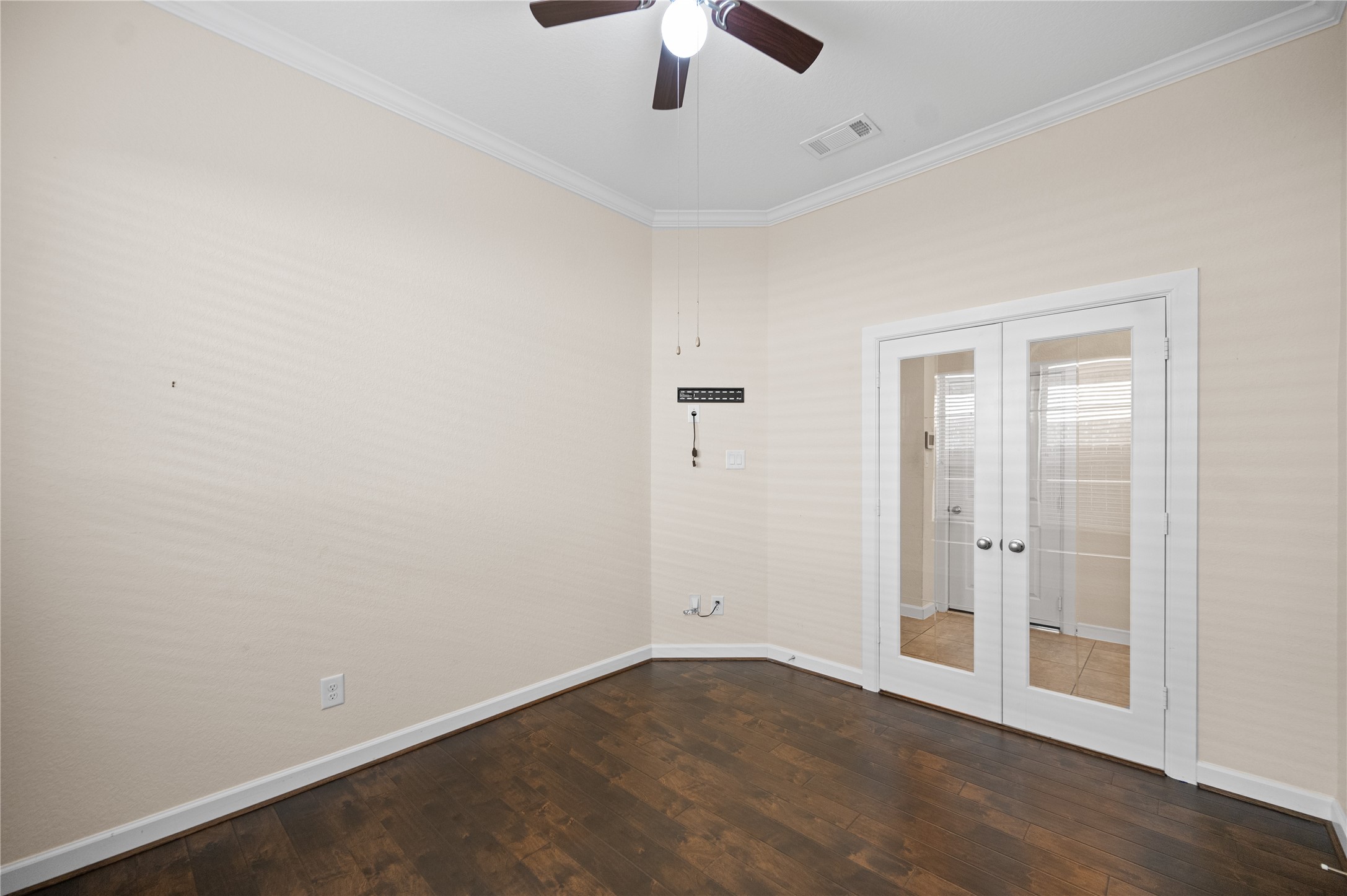 9430 Jayci Hills Lane Cypress, TX 77433 - Photo 7 of 28 an empty room with ceiling fan and window