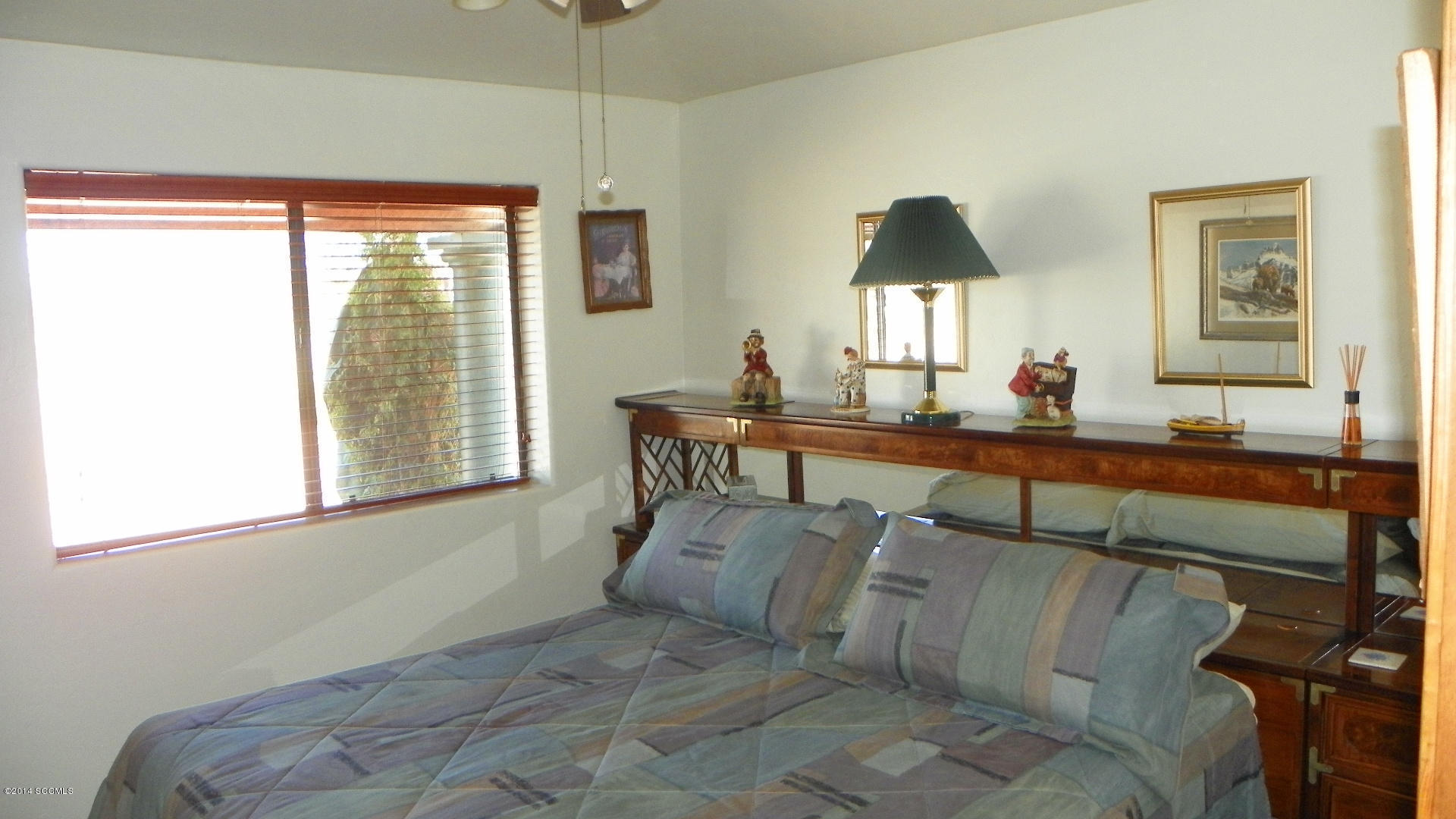 1623 Bufeo Court Rio Rico, AZ 85648 - Photo 45 of 52 a living room with furniture and a window