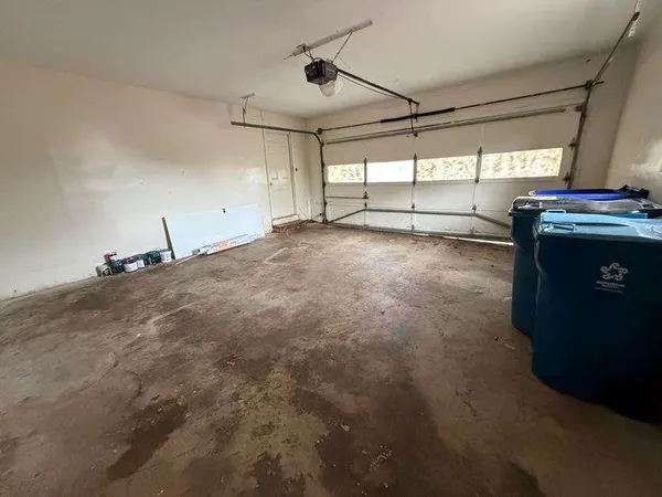 a view of a garage with furniture