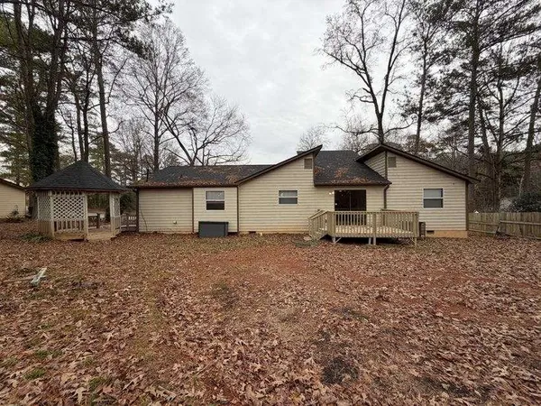 a house with trees in front of it