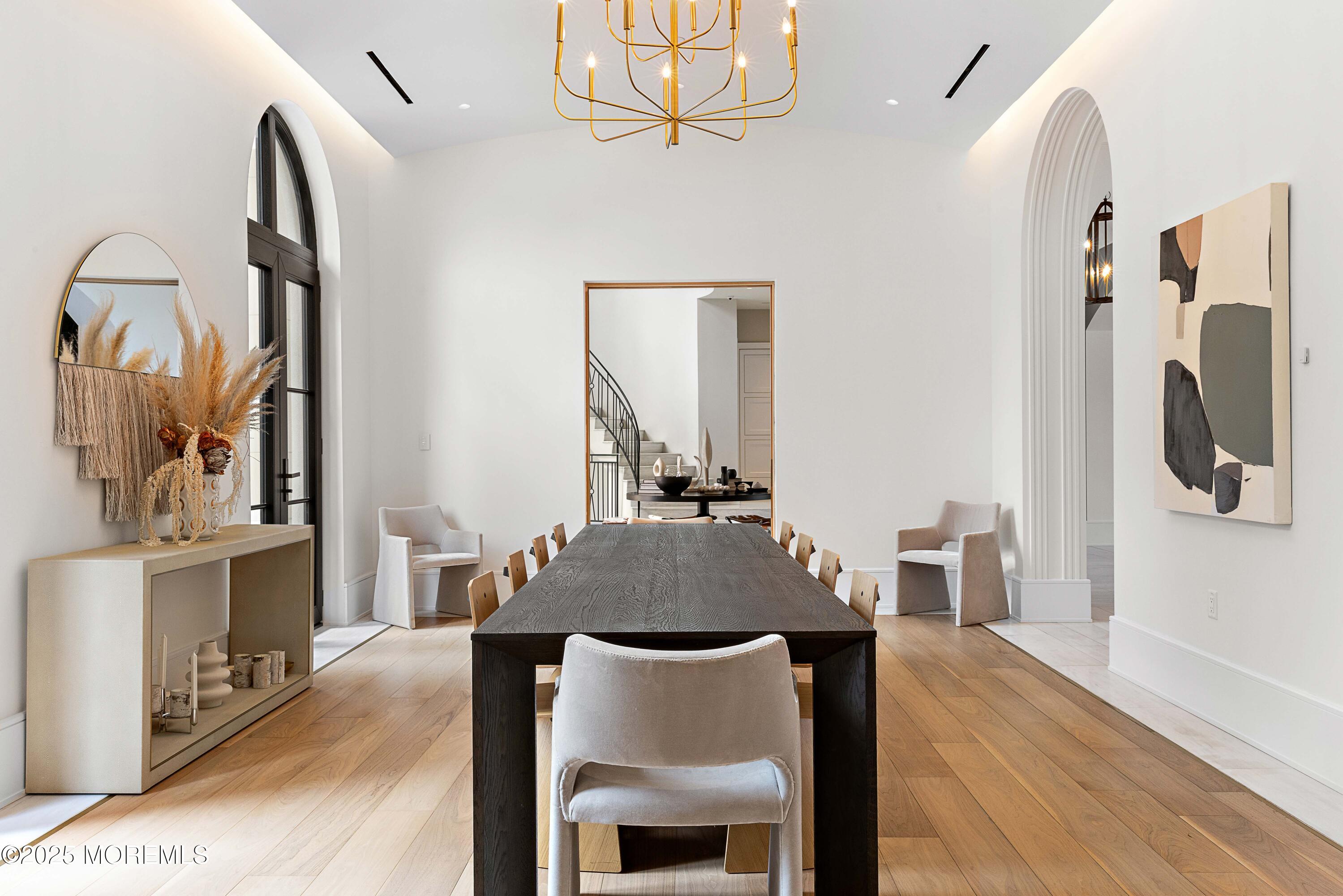 27 Ward Avenue Rumson, NJ 07760 - Photo 19 of 71 a dining room with furniture and a fireplace