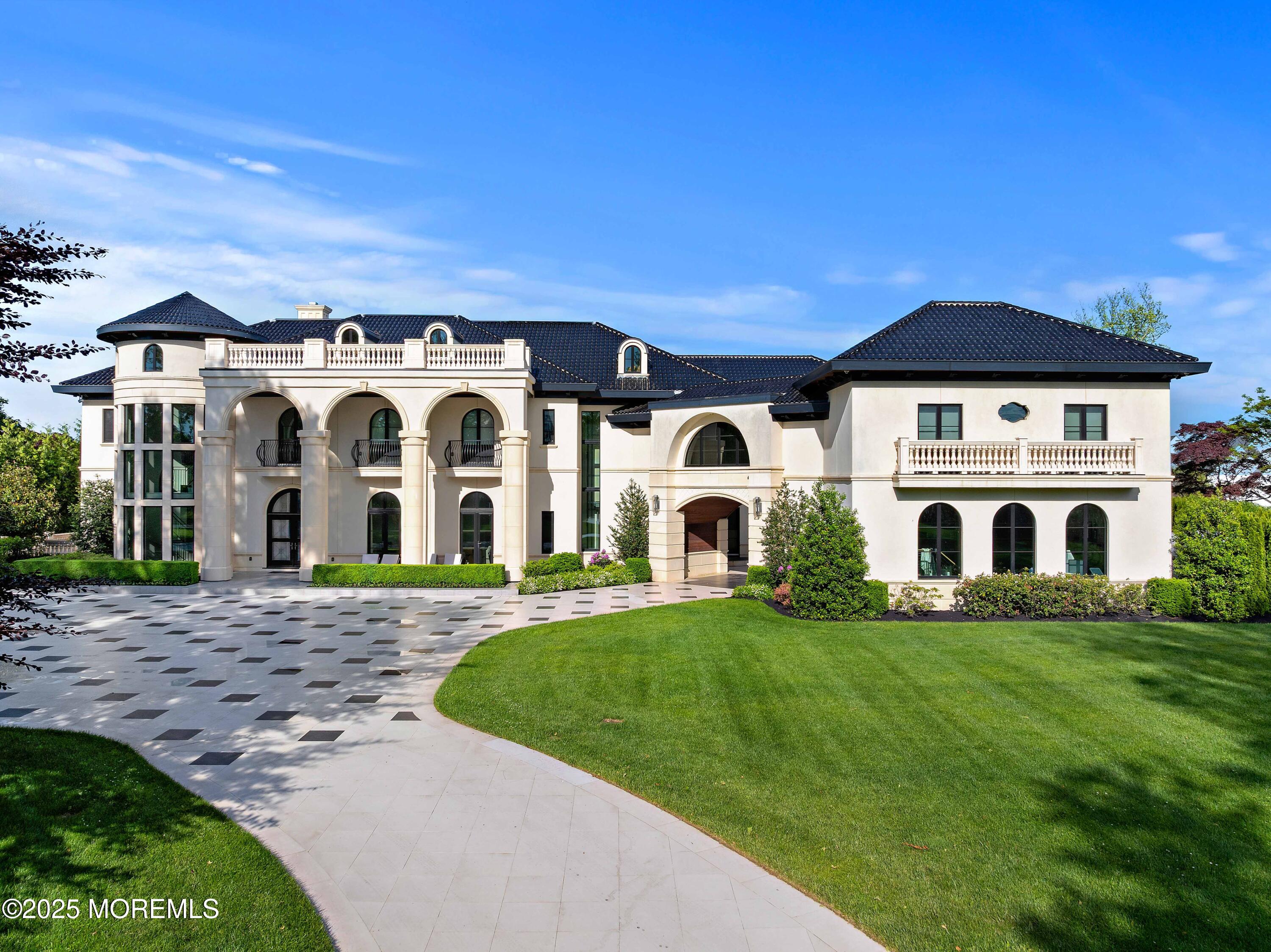 27 Ward Avenue Rumson, NJ 07760 - Photo 2 of 71 a front view of a house with a yard