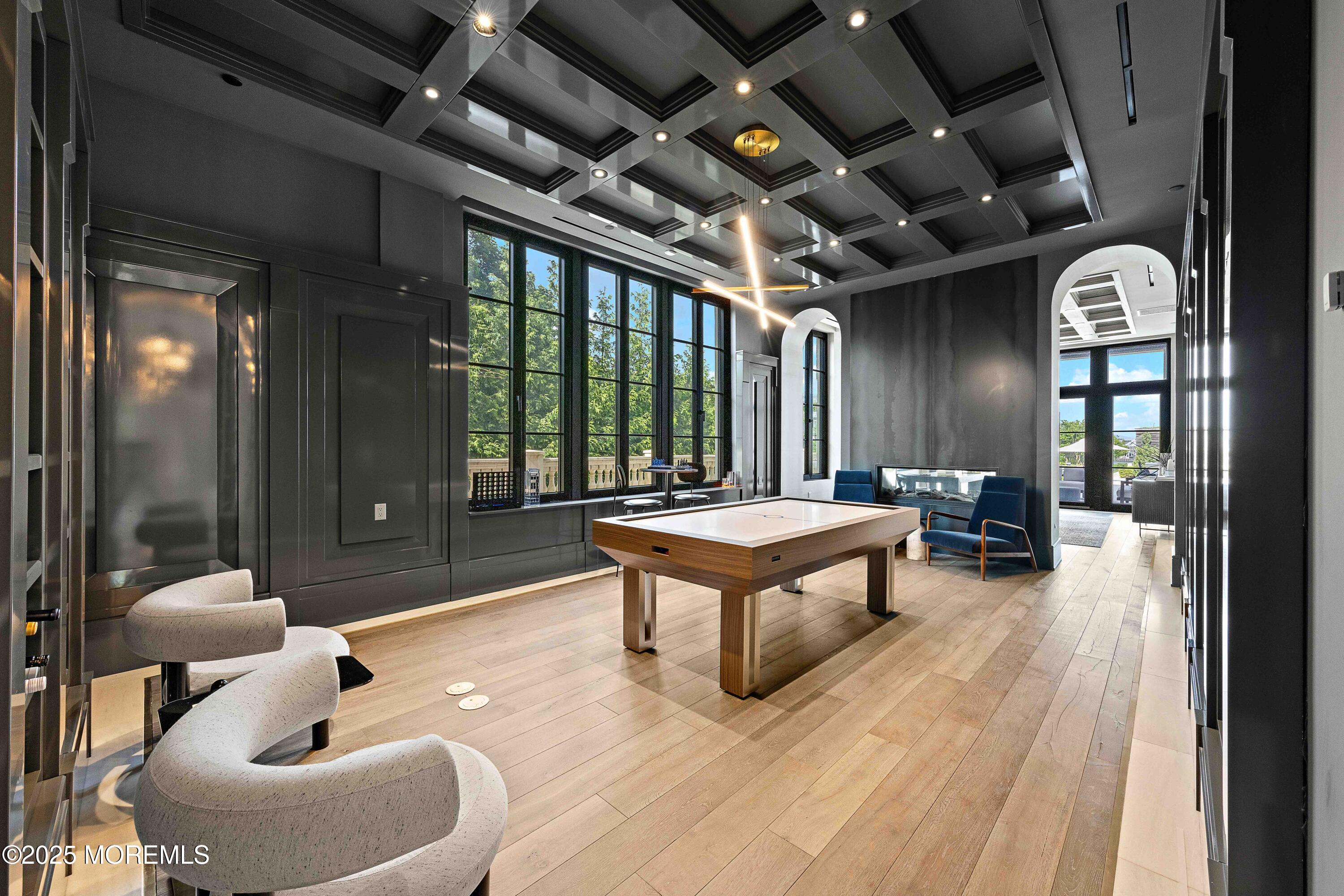 27 Ward Avenue Rumson, NJ 07760 - Photo 22 of 71 a outdoor space with patio furniture and a chandelier