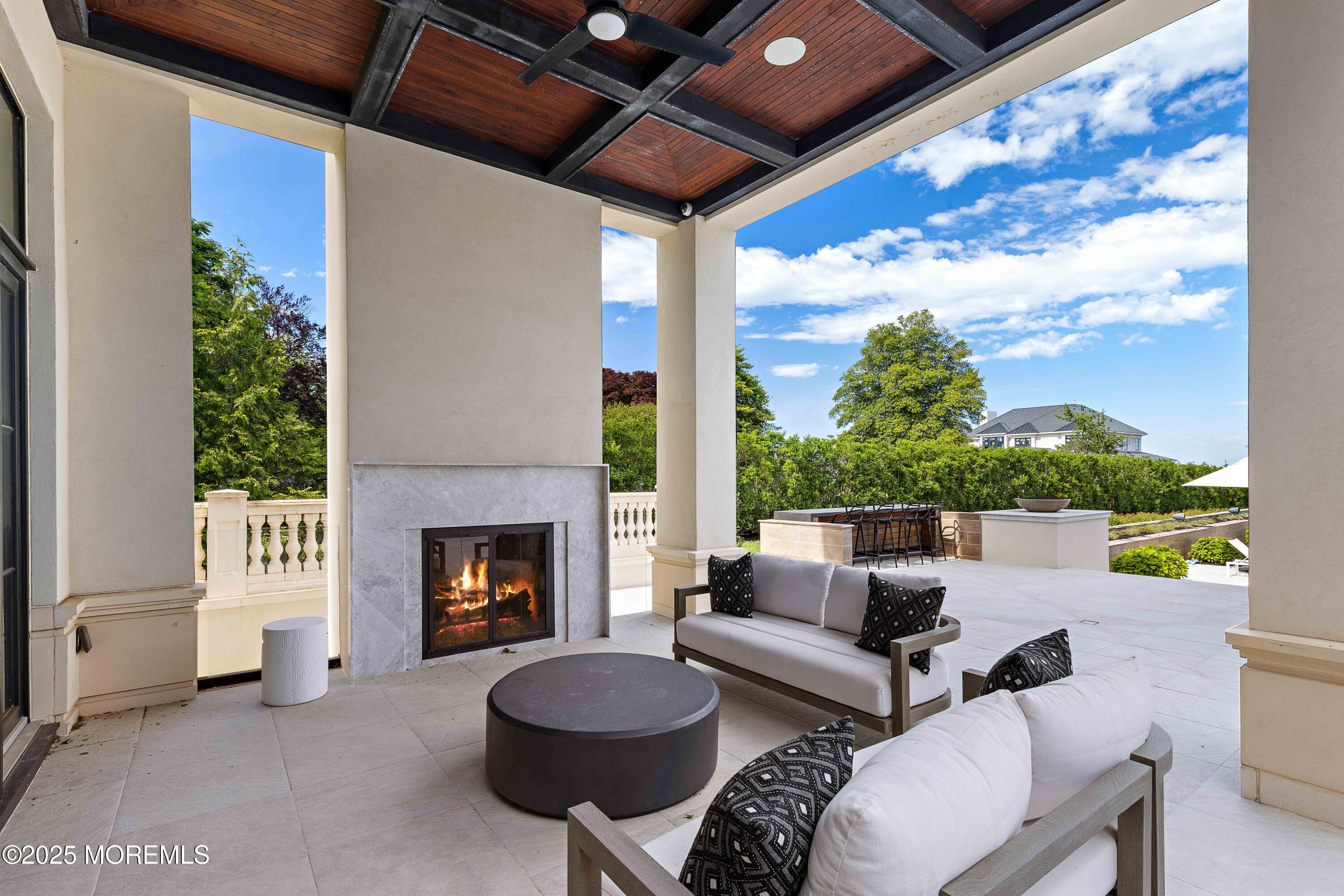 27 Ward Avenue Rumson, NJ 07760 - Photo 24 of 71 a living room with furniture and a fireplace