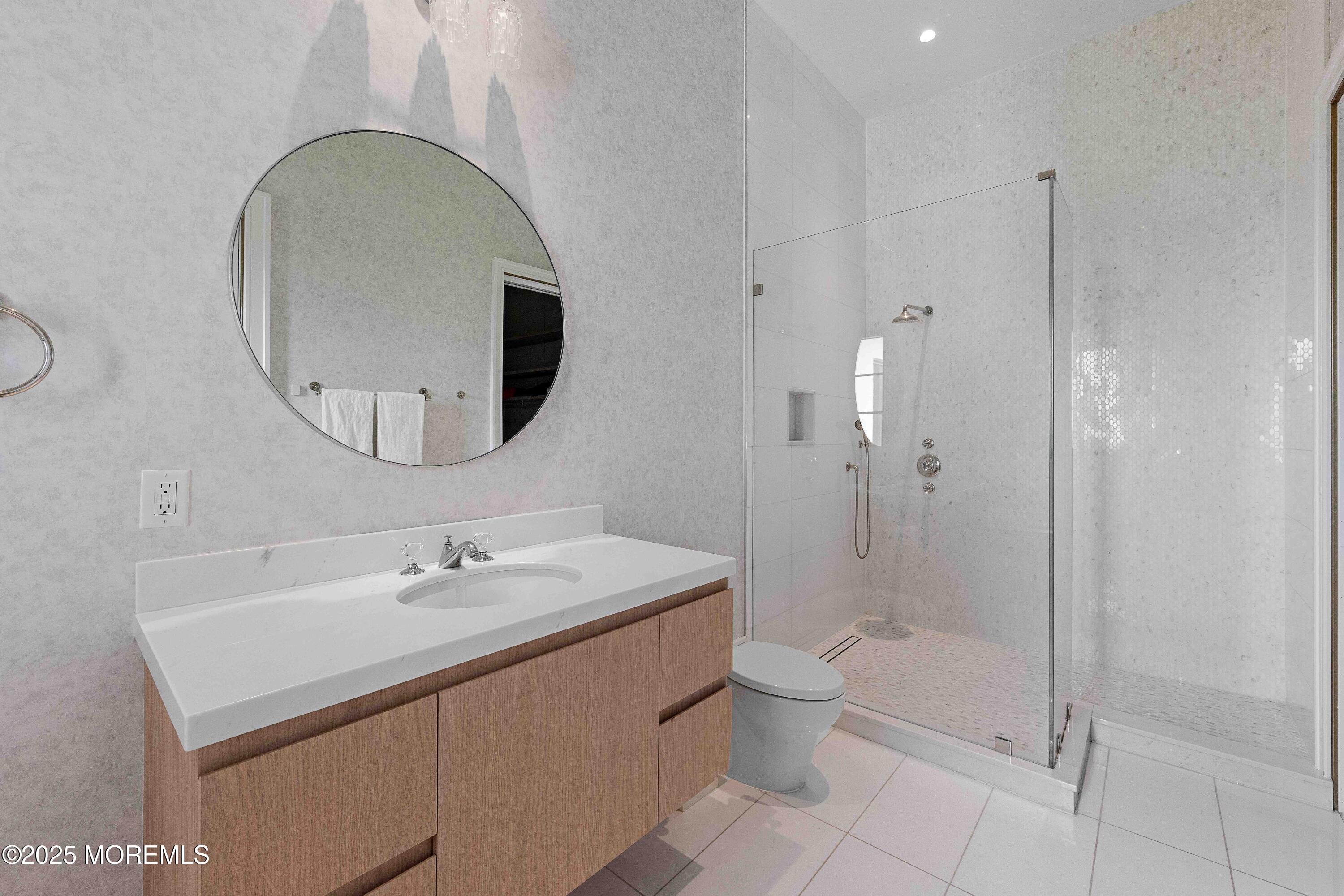 27 Ward Avenue Rumson, NJ 07760 - Photo 35 of 71 a bathroom with a sink a toilet and shower