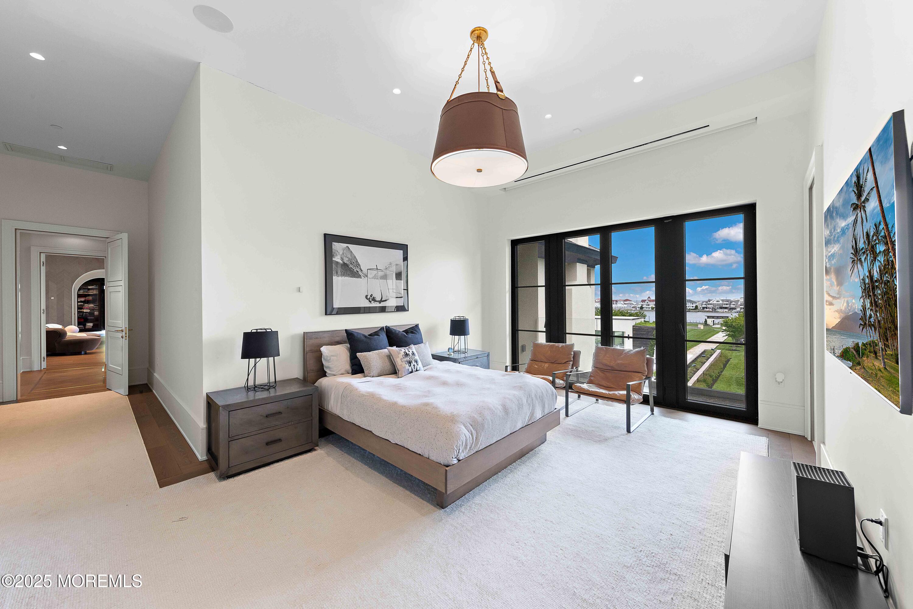 27 Ward Avenue Rumson, NJ 07760 - Photo 37 of 71 a living room with bed furniture and a large window