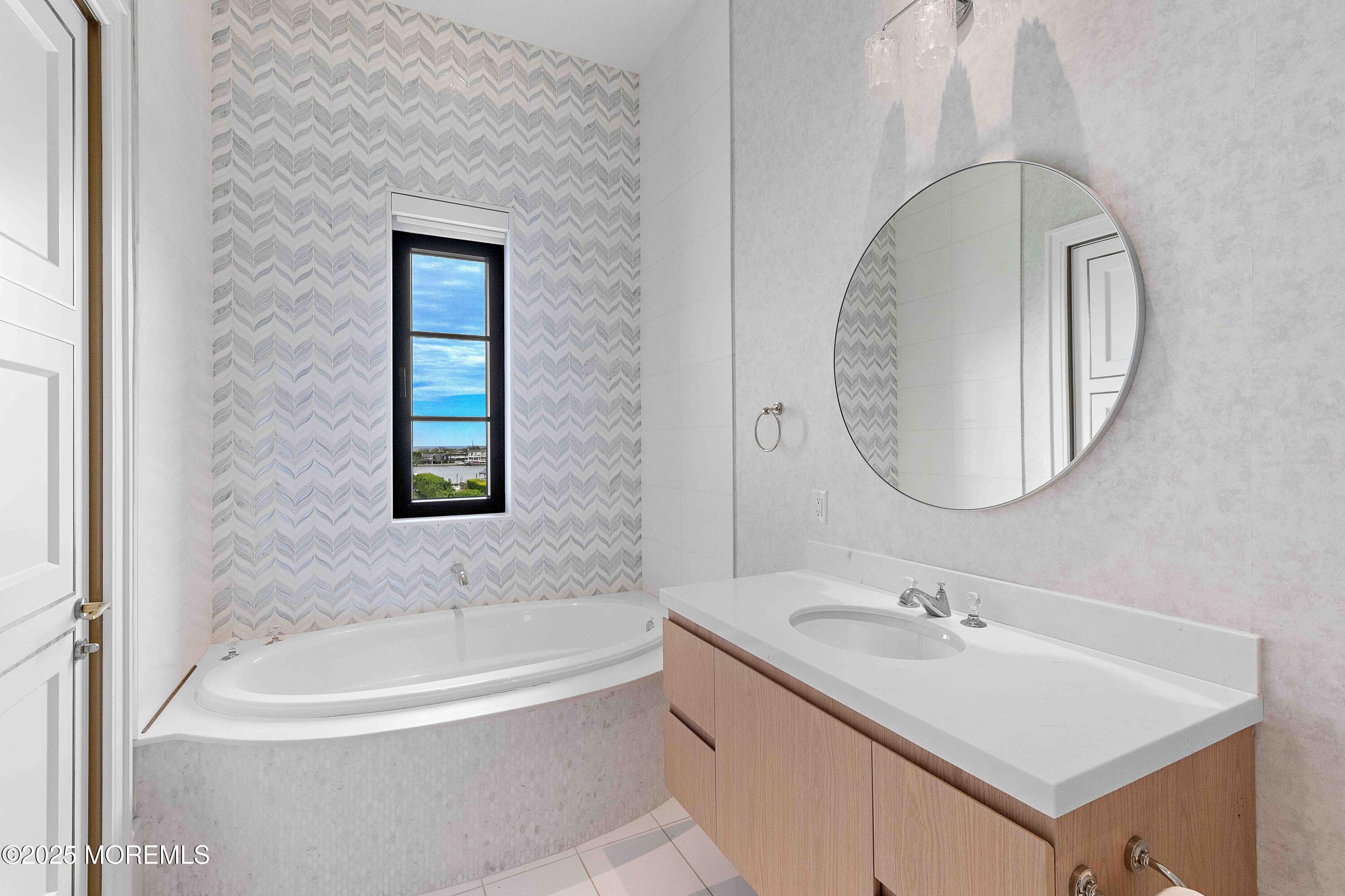 27 Ward Avenue Rumson, NJ 07760 - Photo 38 of 71 a bathroom with a sink and a bathtub