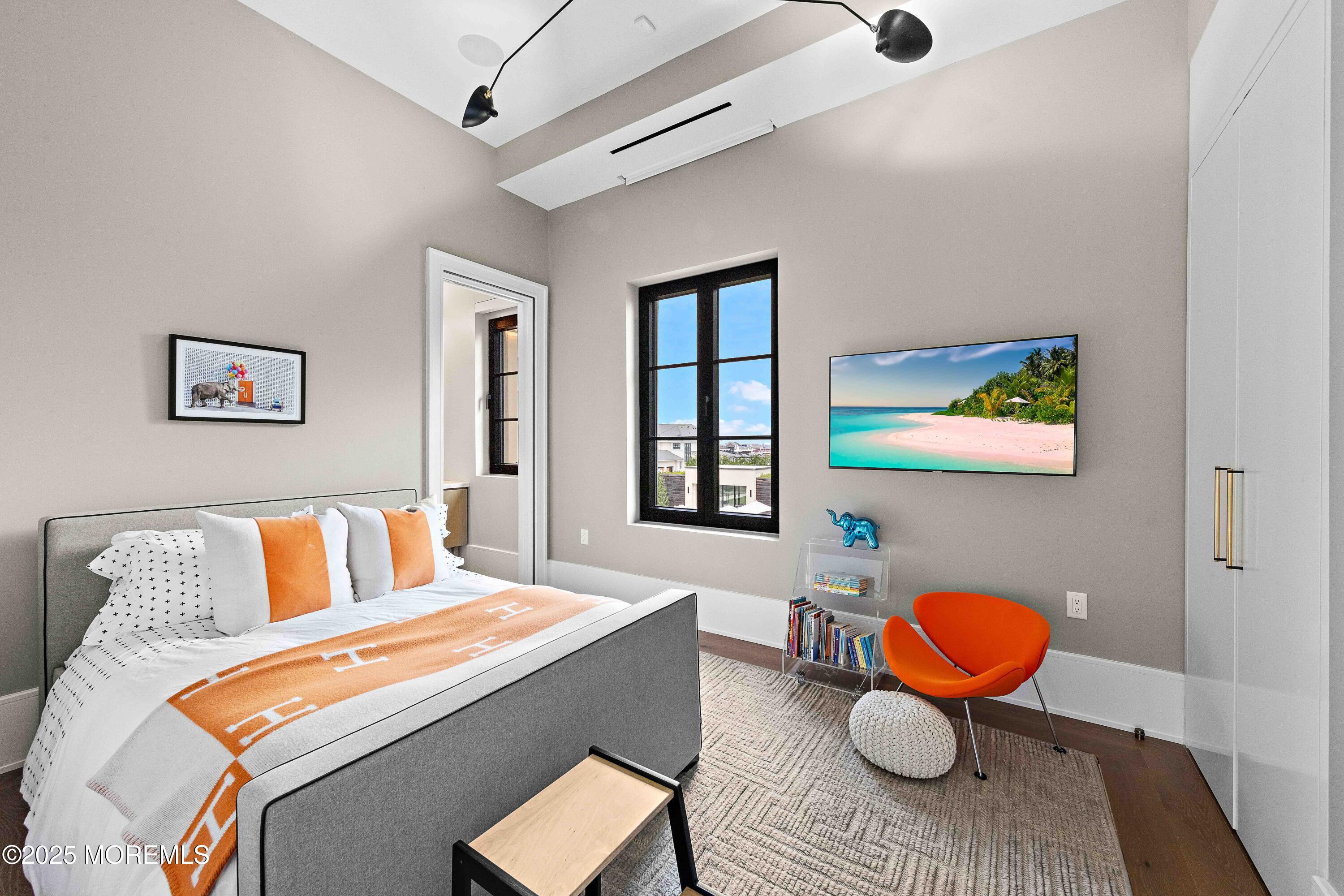 27 Ward Avenue Rumson, NJ 07760 - Photo 39 of 71 a bedroom with furniture and wooden floor