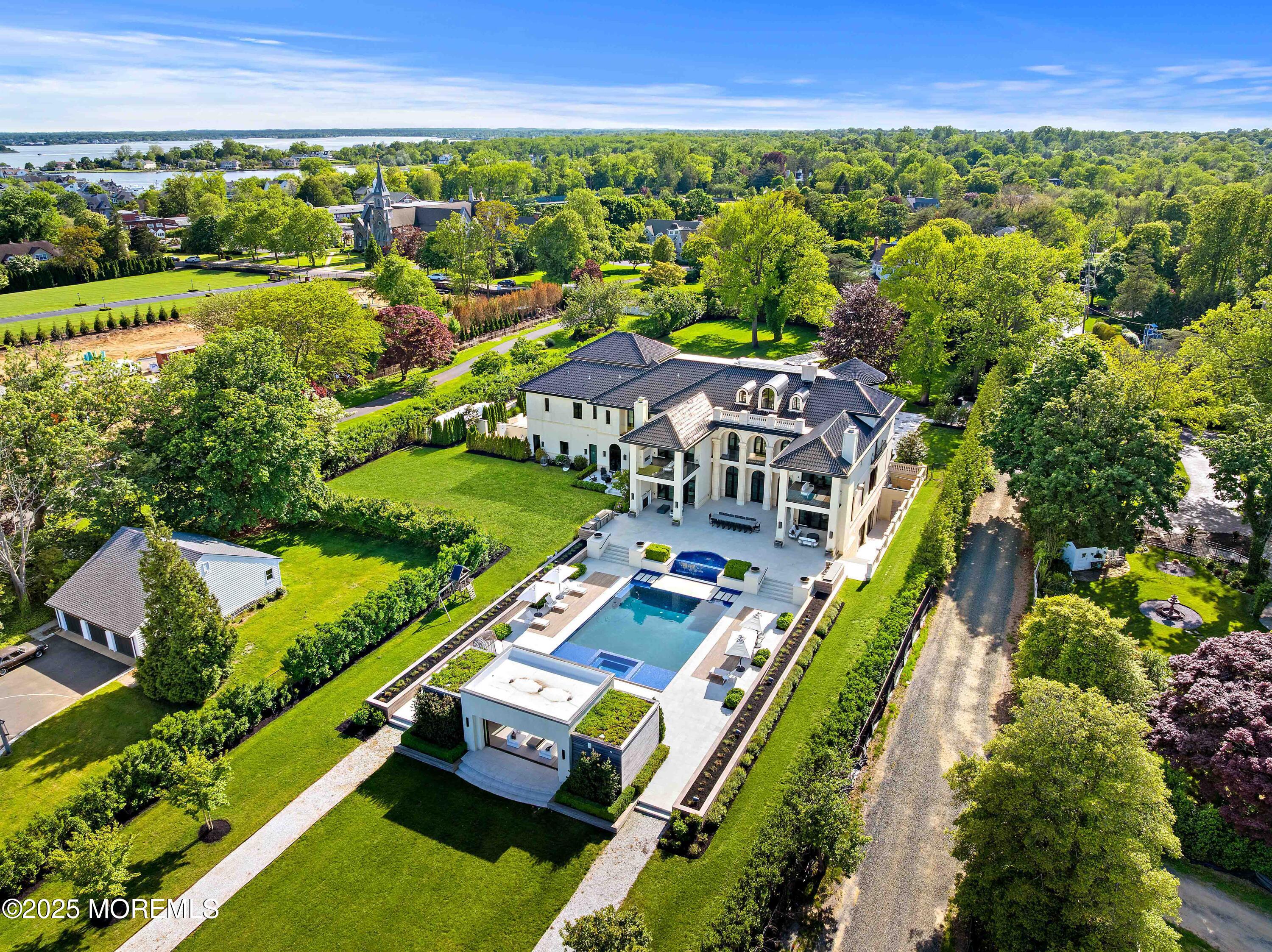 27 Ward Avenue Rumson, NJ 07760 - Photo 5 of 71 an aerial view of a house with a garden