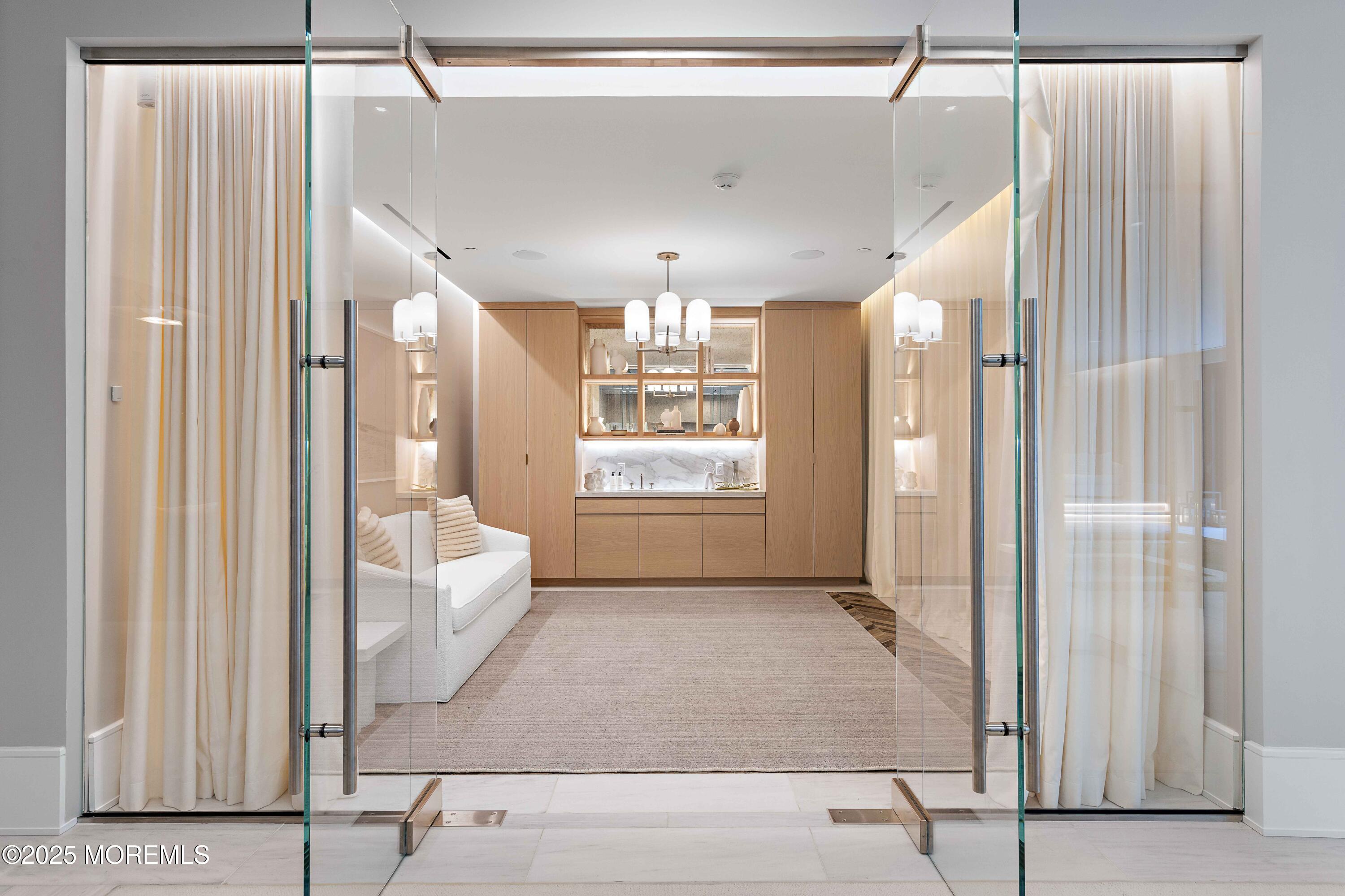 27 Ward Avenue Rumson, NJ 07760 - Photo 52 of 71 a view of an entryway with wooden floor and a livingroom