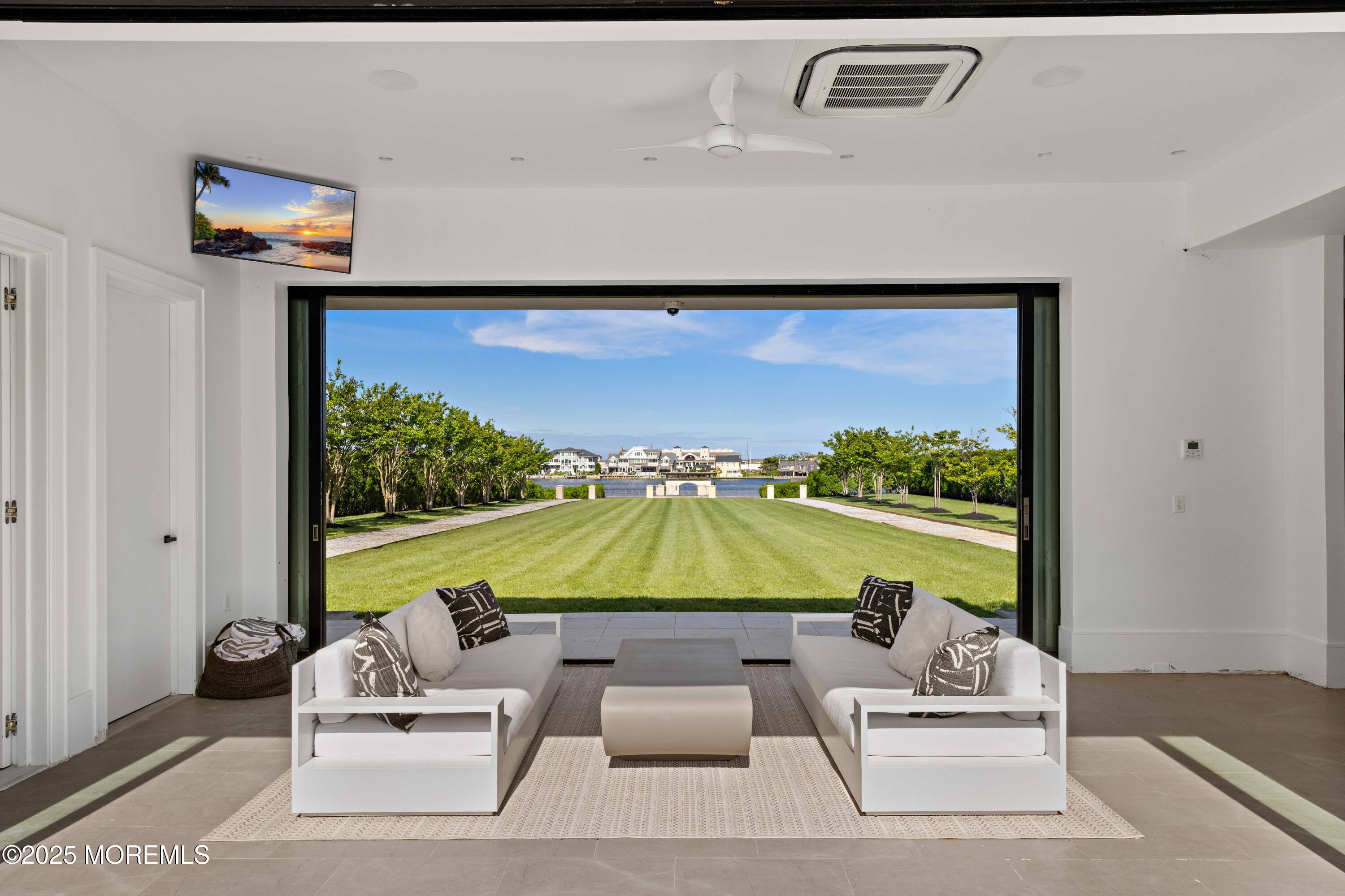 27 Ward Avenue Rumson, NJ 07760 - Photo 58 of 71 a living room with furniture and a large window