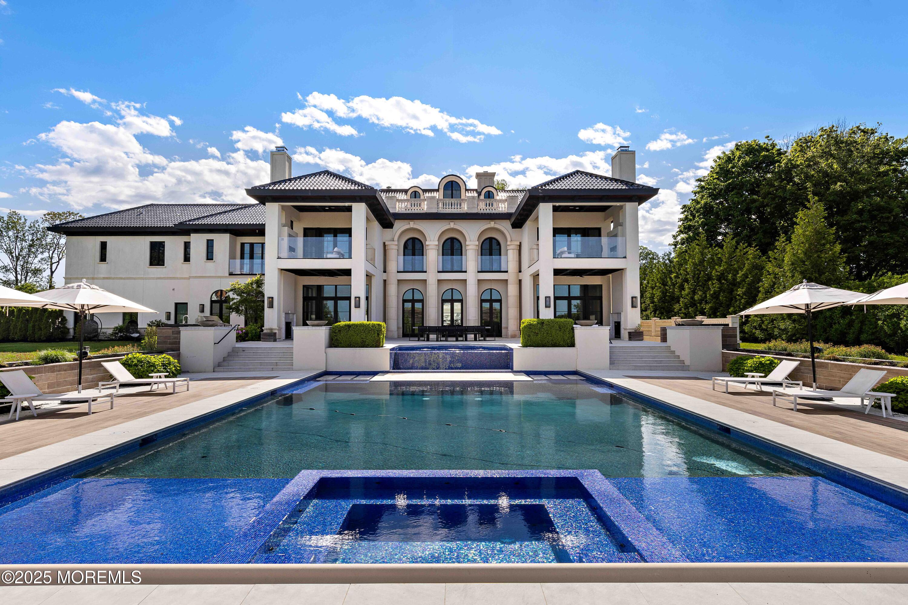 27 Ward Avenue Rumson, NJ 07760 - Photo 62 of 71 a view of a house with swimming pool and furniture