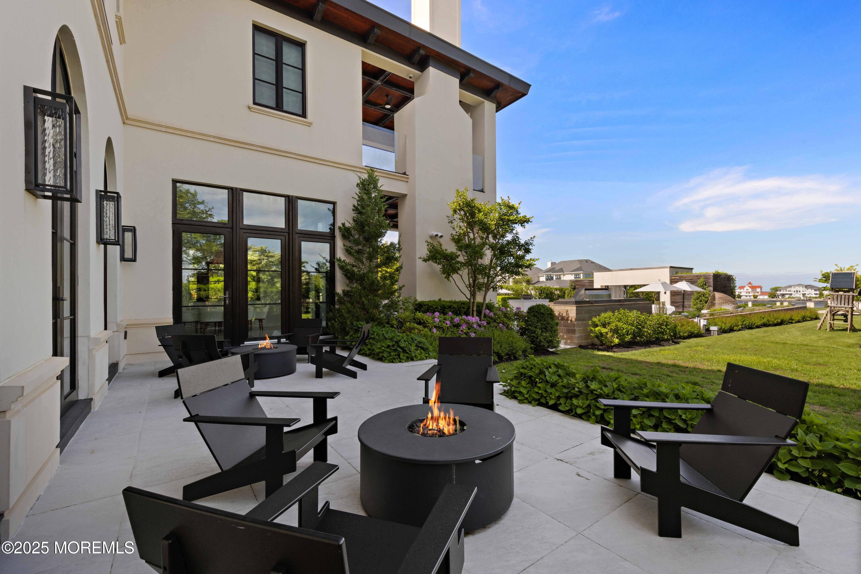 27 Ward Avenue Rumson, NJ 07760 - Photo 63 of 71 a house view with a sitting space garden and patio