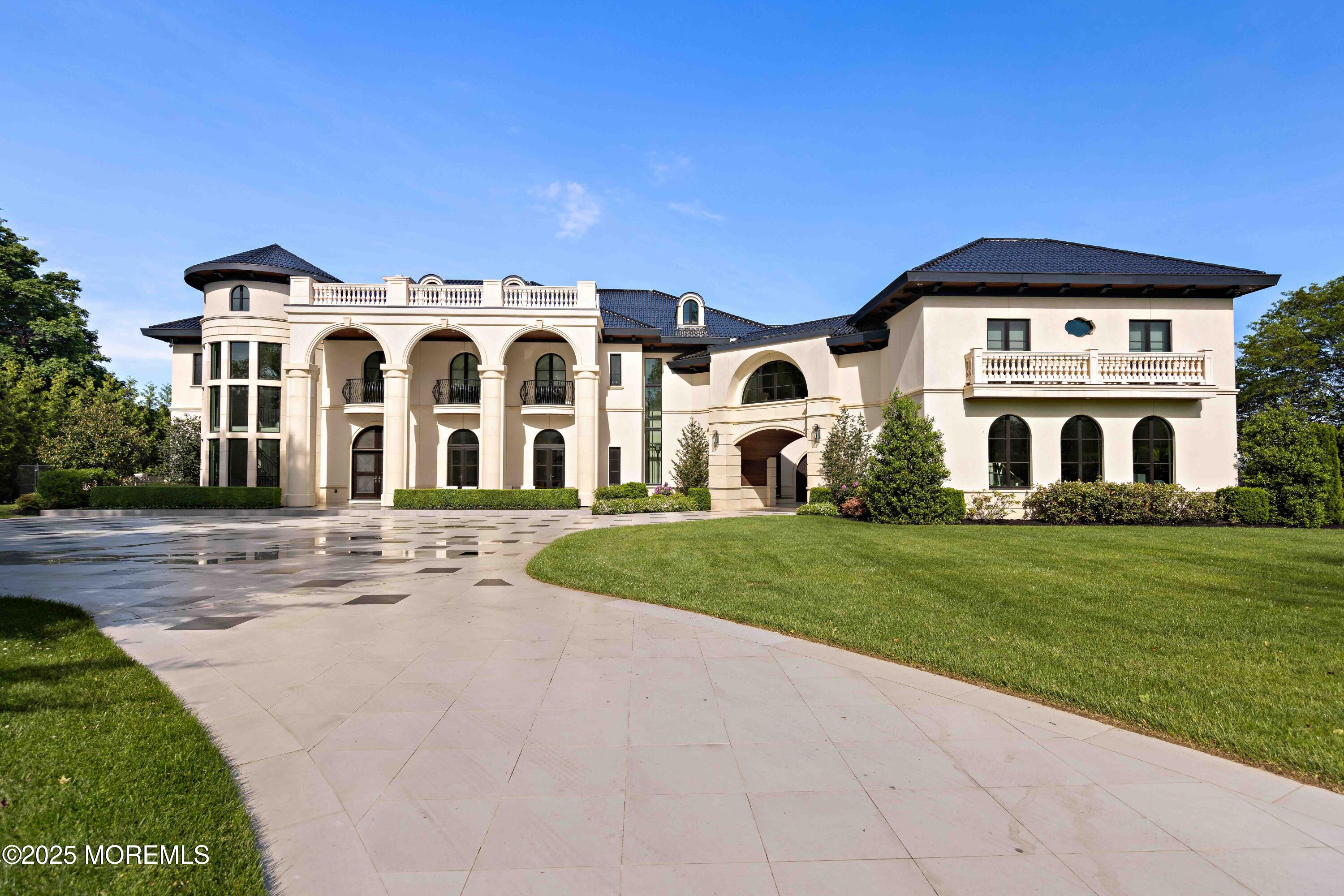 27 Ward Avenue Rumson, NJ 07760 - Photo 65 of 71 a front view of a house with a yard