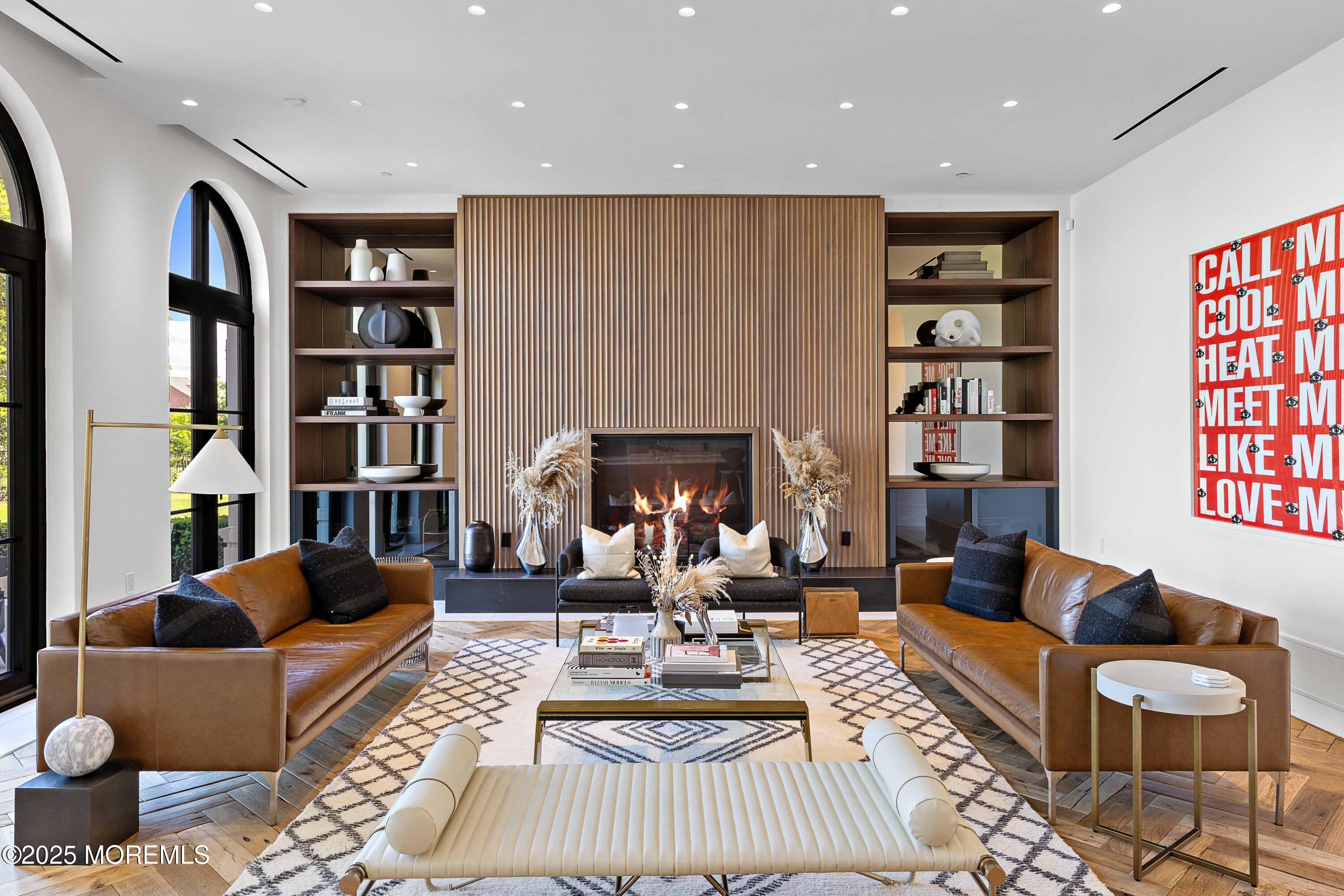 27 Ward Avenue Rumson, NJ 07760 - Photo 9 of 71 a living room with furniture and a fireplace