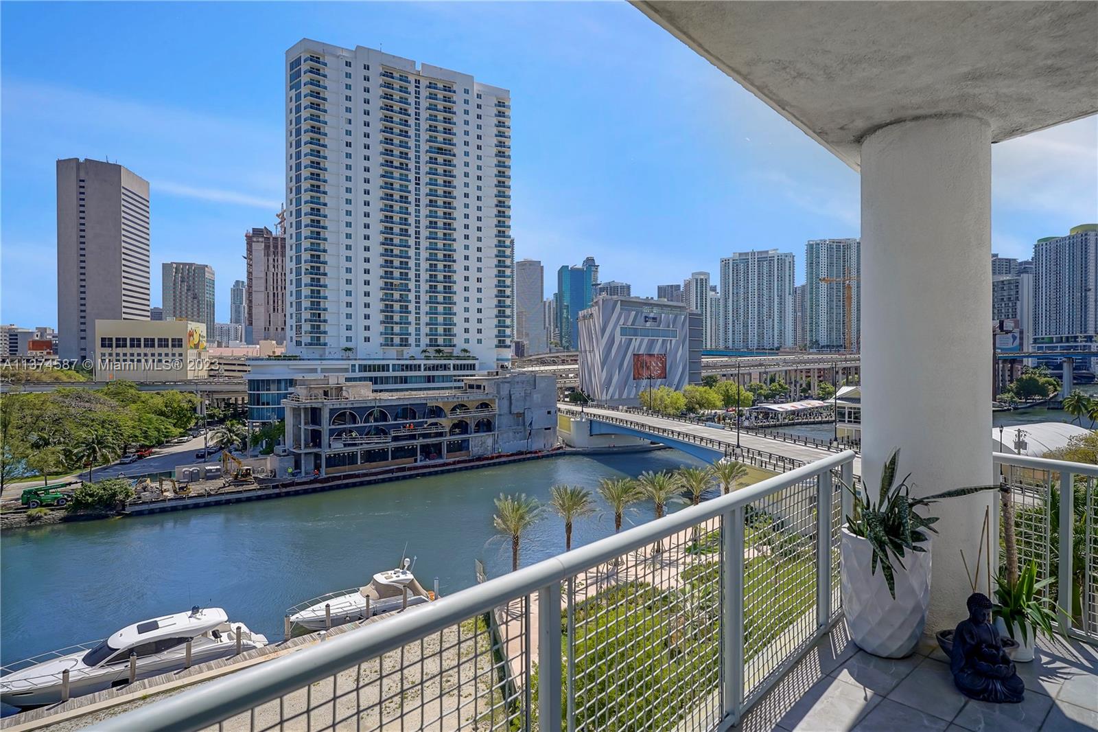 10 Southwest South River Drive, Unit 703 Miami, FL 33130 - Photo 19 of 47 a view of swimming pool with outdoor seating and lake view