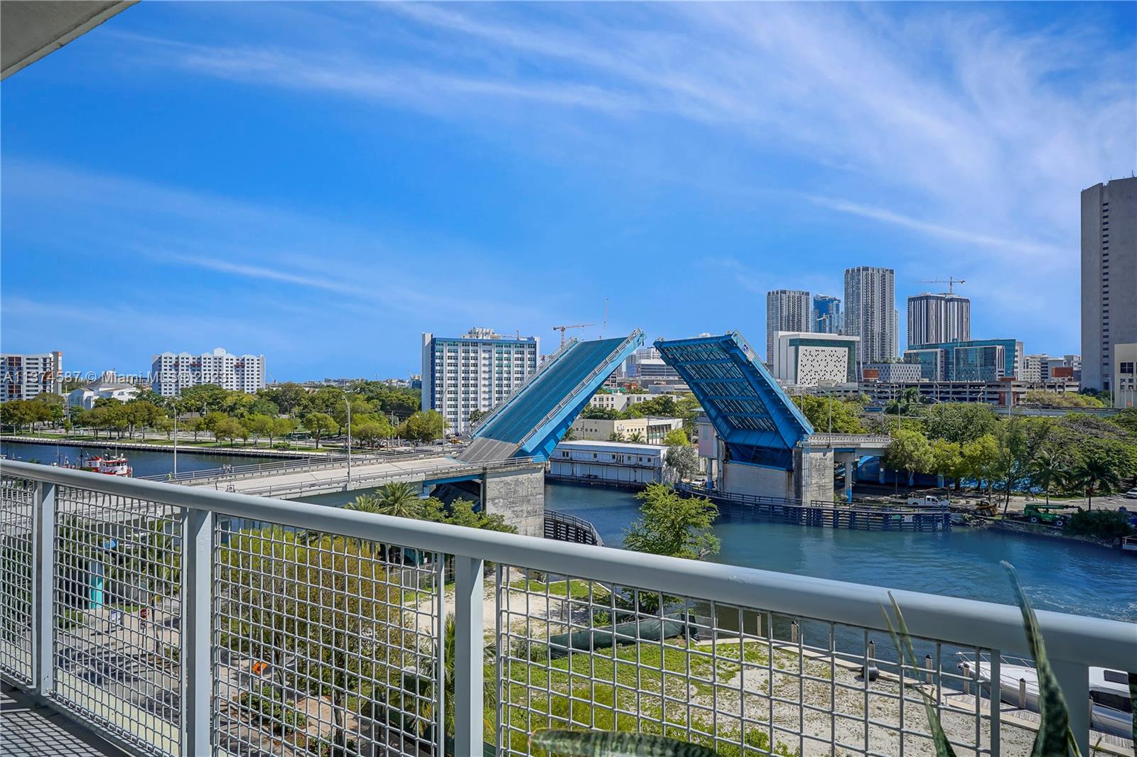 10 Southwest South River Drive, Unit 703 Miami, FL 33130 - Photo 22 of 47 a view of a city from a balcony