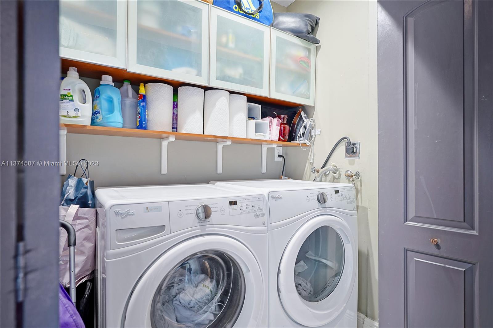 10 Southwest South River Drive, Unit 703 Miami, FL 33130 - Photo 31 of 47 a utility room with dryer and washer