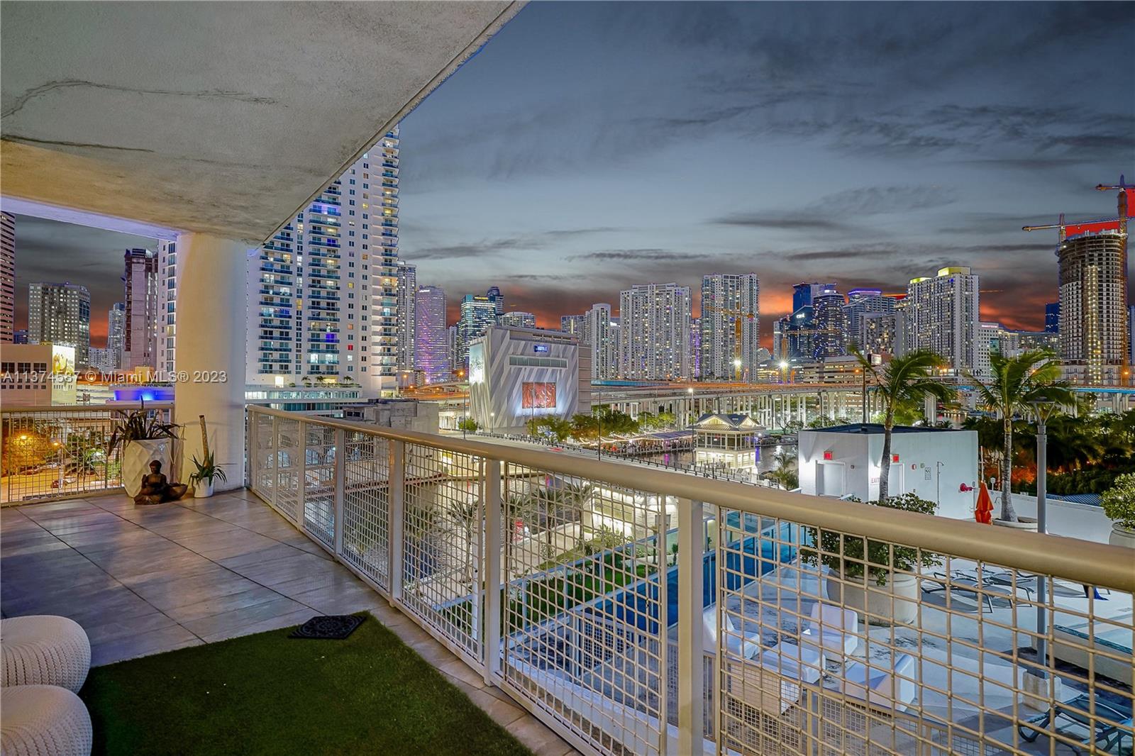 10 Southwest South River Drive, Unit 703 Miami, FL 33130 - Photo 7 of 47 a view of swimming pool with outdoor seating