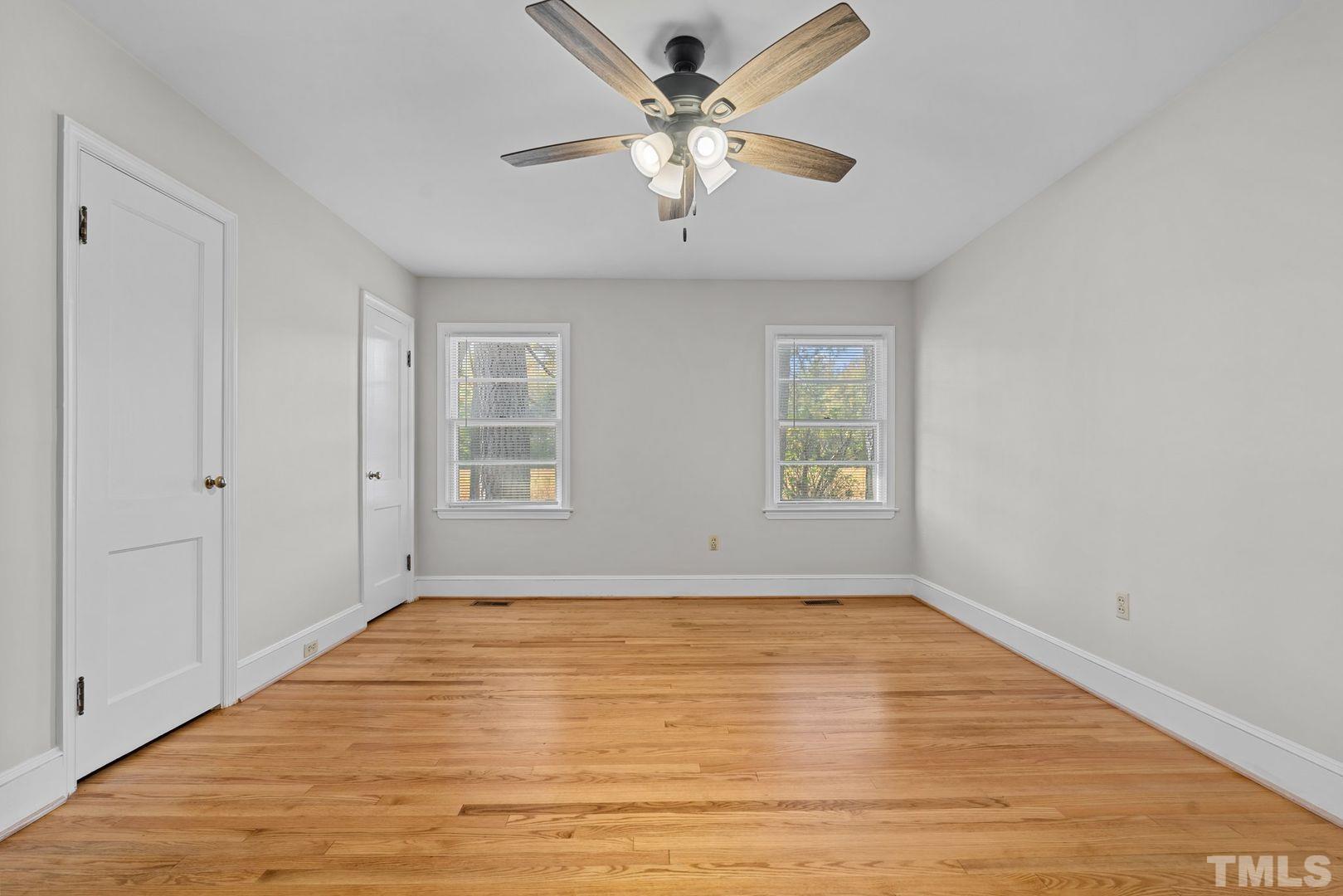 6198 Highway 401 Bunnlevel, NC 28323 - Photo 13 of 33 wooden floor in an empty room with a window