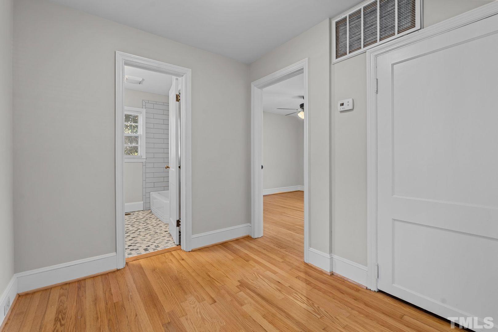 6198 Highway 401 Bunnlevel, NC 28323 - Photo 19 of 33 a view of a room with wooden floor and bathroom