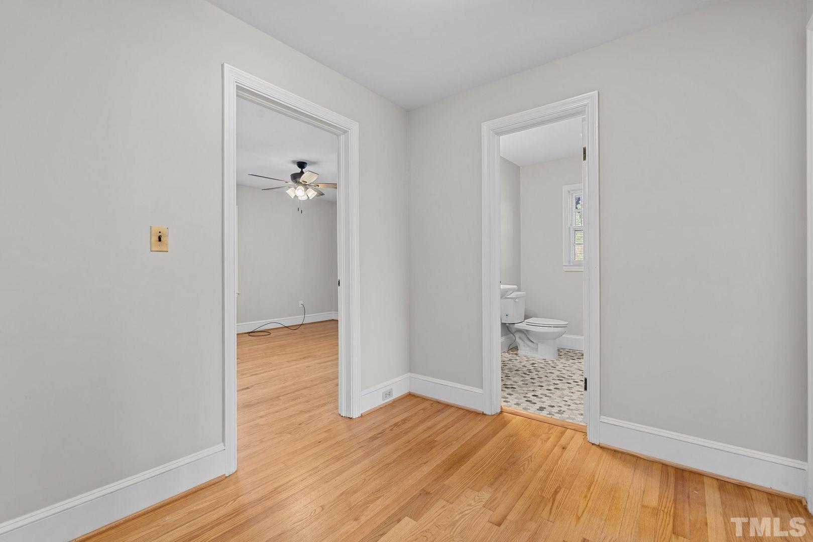 6198 Highway 401 Bunnlevel, NC 28323 - Photo 22 of 33 wooden floor in an empty room