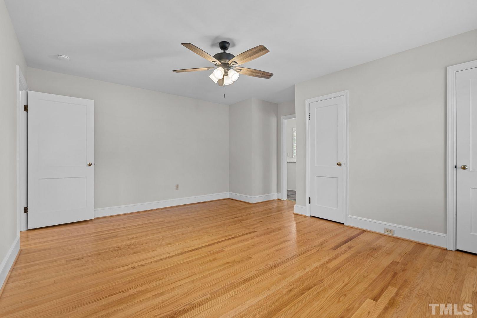 6198 Highway 401 Bunnlevel, NC 28323 - Photo 24 of 33 a view of an empty room with wooden floor